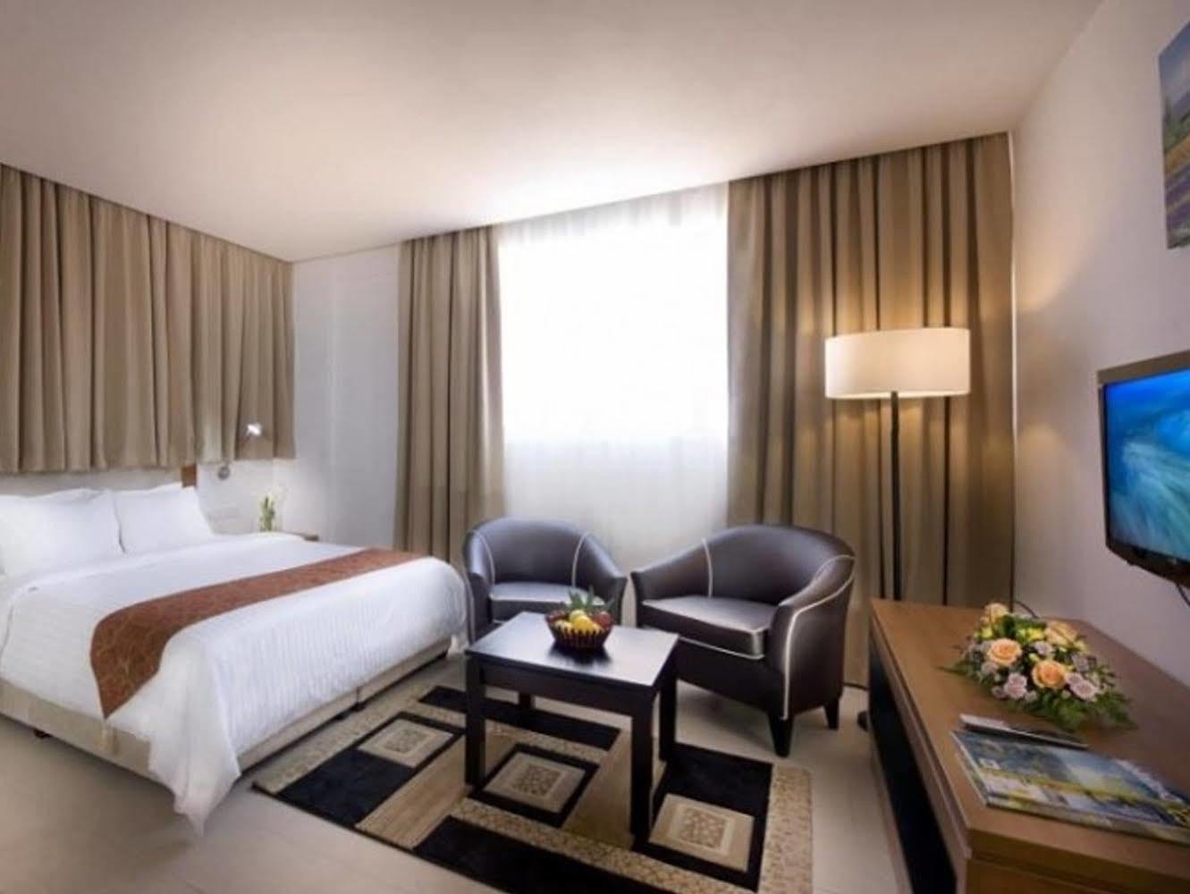 Gloria Swiss Hotel & Apartment Szandakan Kültér fotó